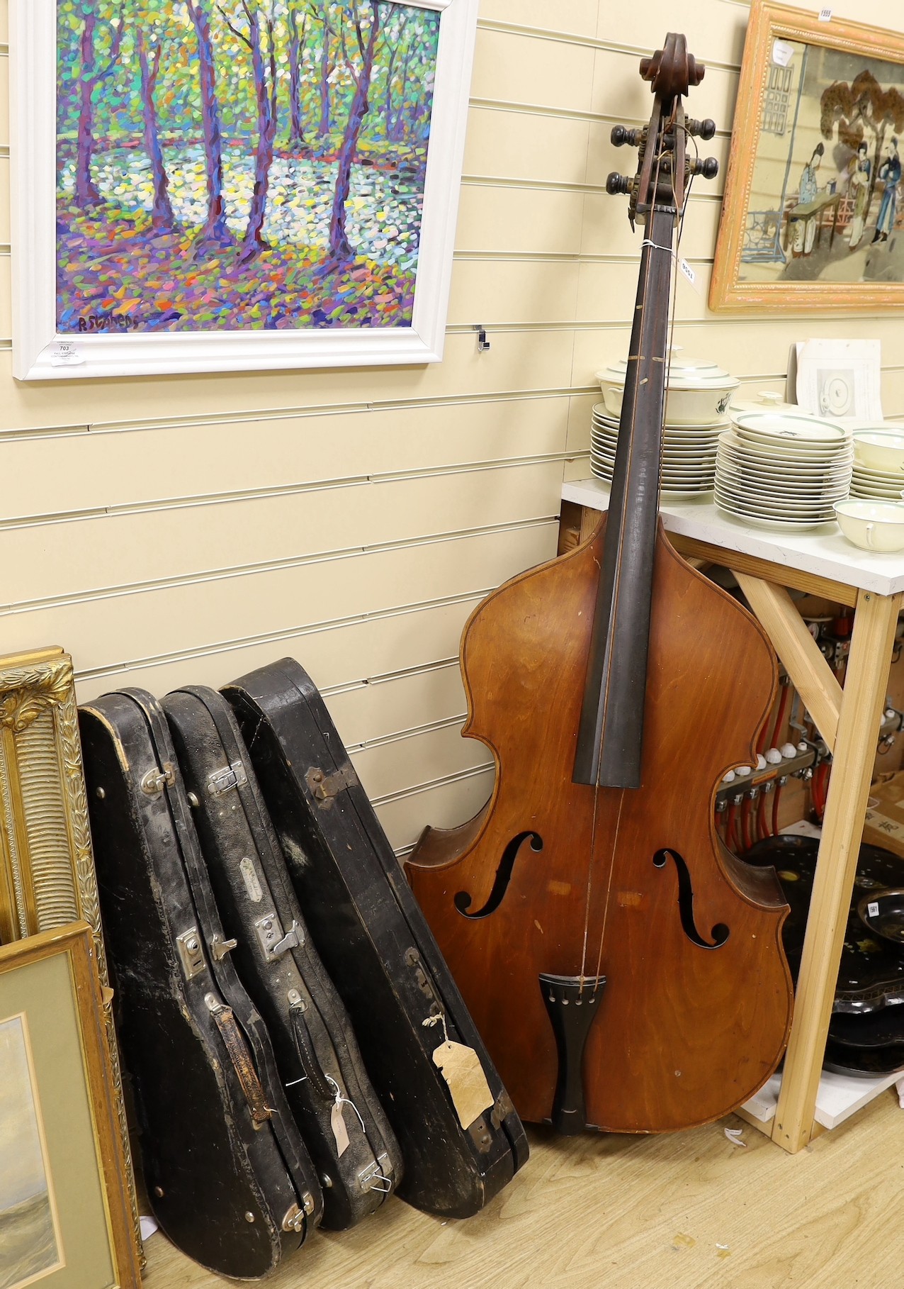 A double bass and three various violins, double bass 165cms high